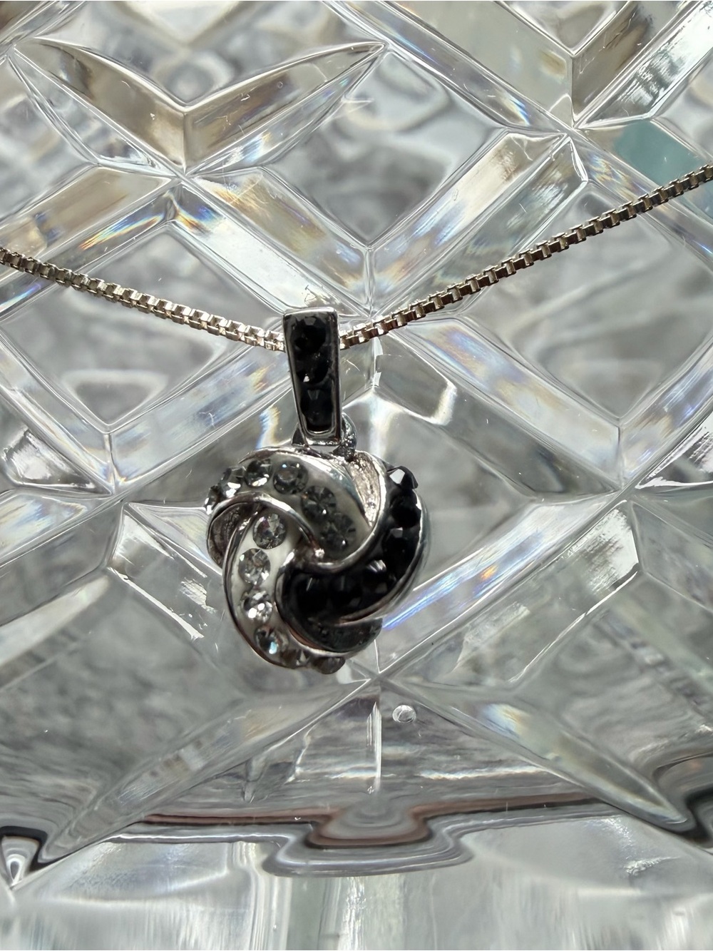 Sterling Silver Knot Pendant Necklace with white and black czs.
